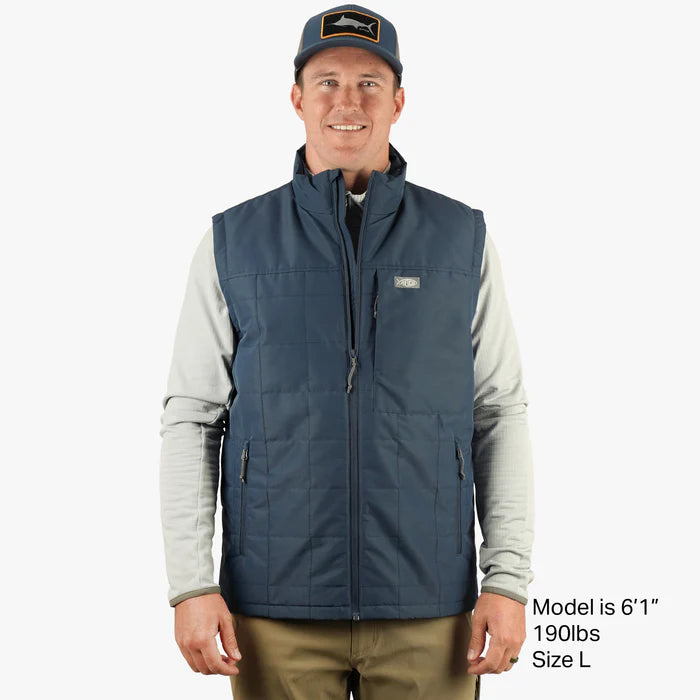 Aftco Crosswind Puff Vest featuring lightweight insulation, a sleek design, and zippered pockets, ideal for warmth and mobility during fishing and outdoor adventures.