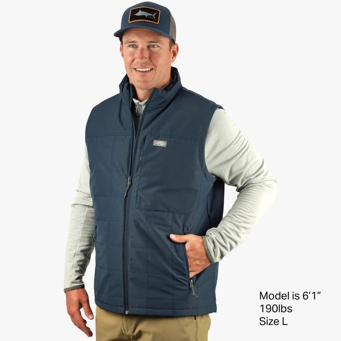 Aftco Crosswind Puff Vest featuring lightweight insulation, a sleek design, and zippered pockets, ideal for warmth and mobility during fishing and outdoor adventures.