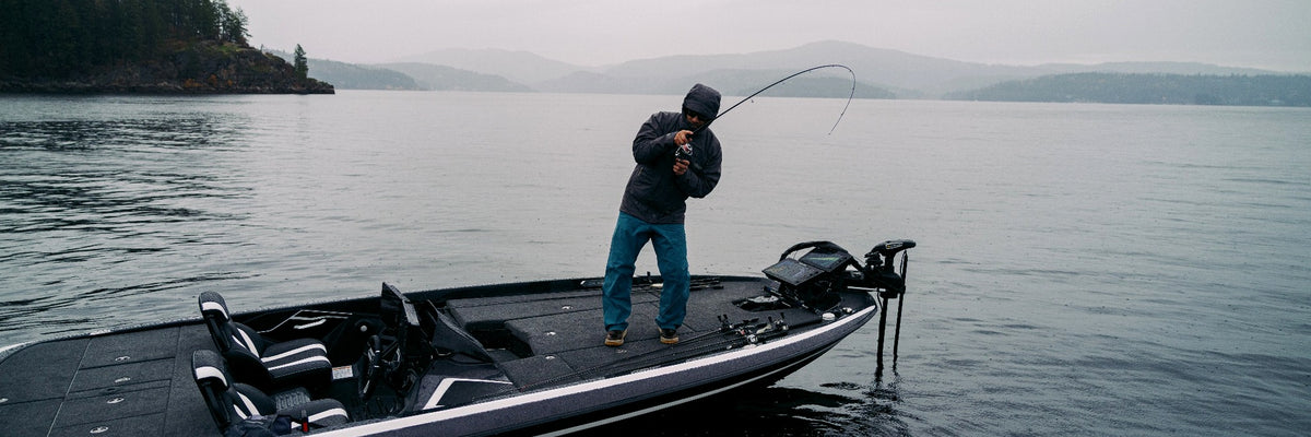 Angler fishing from a boat on the water